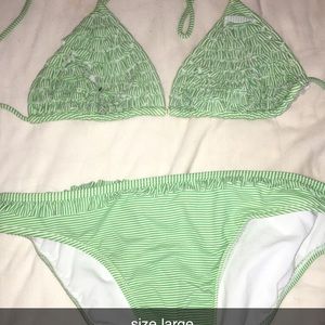 green ruffled bathing suit